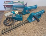 Makita Hedge Trimmer Grass Clipper W/two 7.2V Battery W/charger DC7100 UM3000D. Fixed Price $90.00.