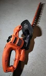 Black And Decker BEHT150 17" 3.2-AMP Corded Dual-action Electric Hedge Trimmer. Fixed Price $24.88.