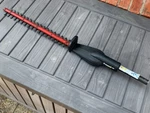 Ryobi Expand-it UT15703A Universal 17-1/2" Hedge Trimmer Attachment. Fixed Price $59.99.